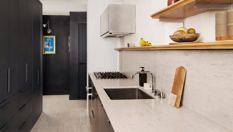 A Modern Marble Kitchen With Long Linear Veins and a Thin Edge